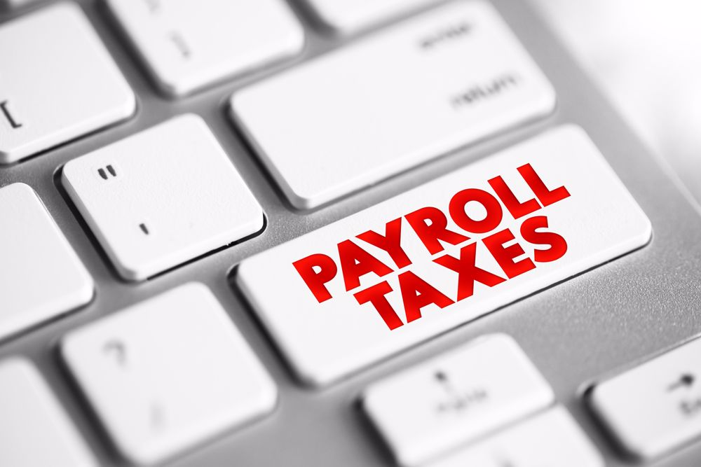 Payroll Taxes are the taxes employees and employers pay on wages, tips and salaries, text concept button on keyboard